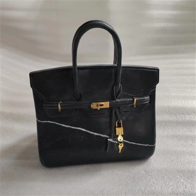 Musta Marquina Marble laukku